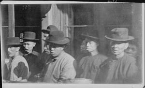 group-of-men-standing-on-a-street-chinatown-san-francisco-5b3c15